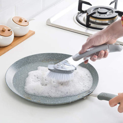 De Borstel van de Pottenpan scrubbing gray plastic dish van de keukengootsteen met Zeepautomaat