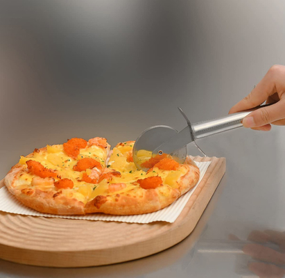 Van het de Snijderswiel van de roestvrij staalpizza van de het Messenkeuken het Bakselhulpmiddelen