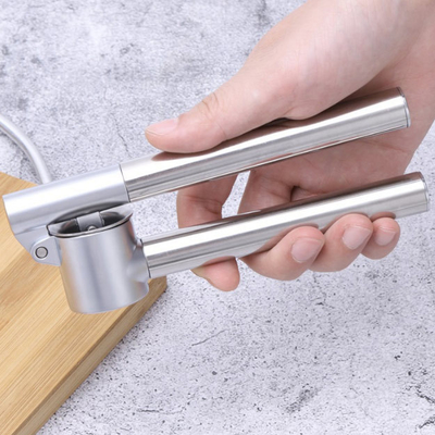 Van de de Gehaktmolenroest van de knoflookpers Bewijs 304 de Maalmachine &amp; het Schilmesjereeks van het Roestvrij staalknoflook