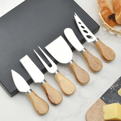 de Kaasmessen van 4pcs 6pcs met Houten Handvatroestvrij staal dat worden geplaatst